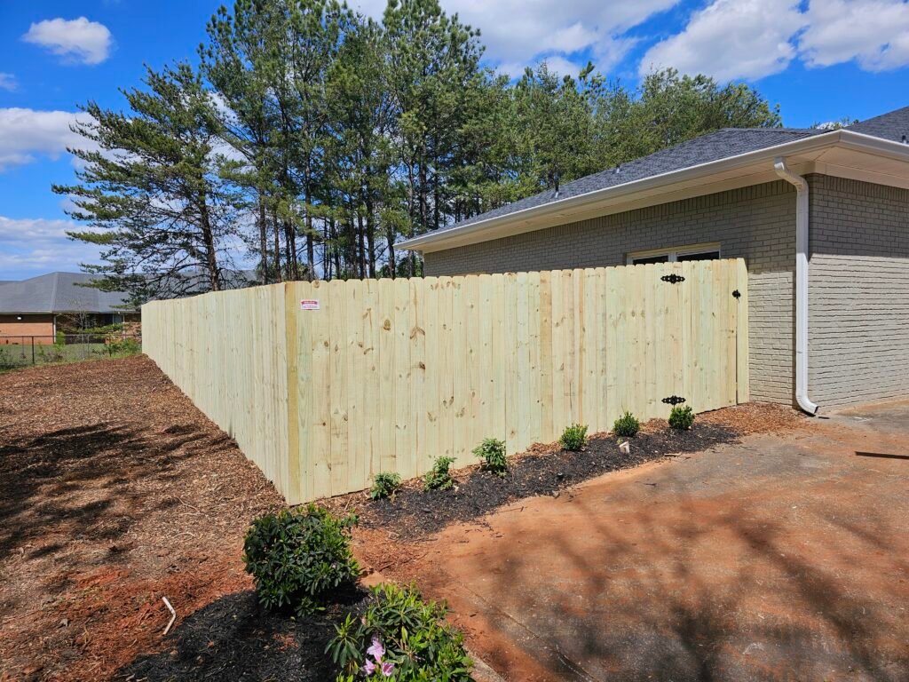 Wood privacy fence installation in Acworth Georgia