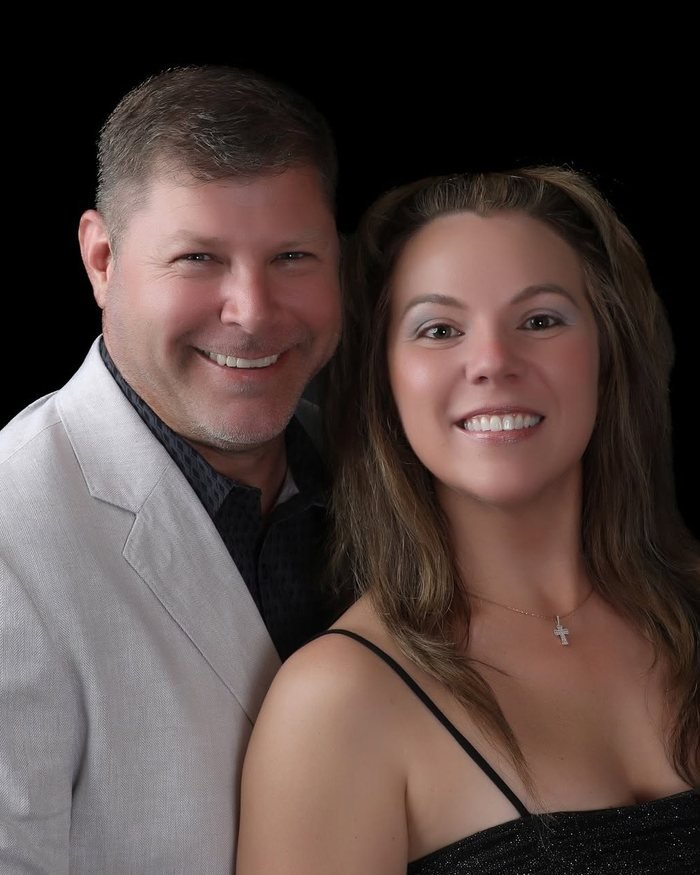Keith and Mari Cox, the husband and wife owners of Metro Area Fence in Marietta, Georgia